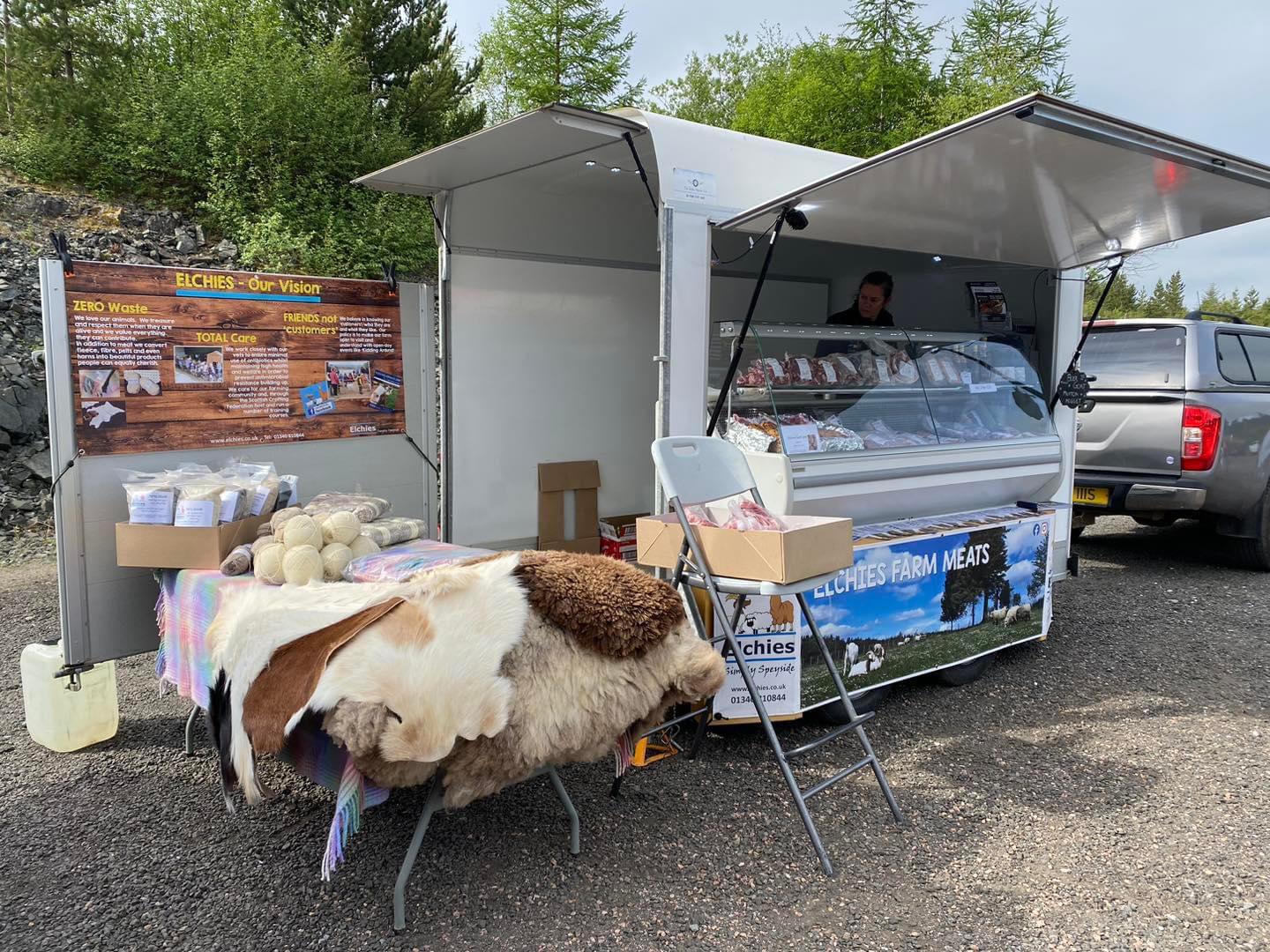 Elchies Farm pop-up stall at a farmers market event.