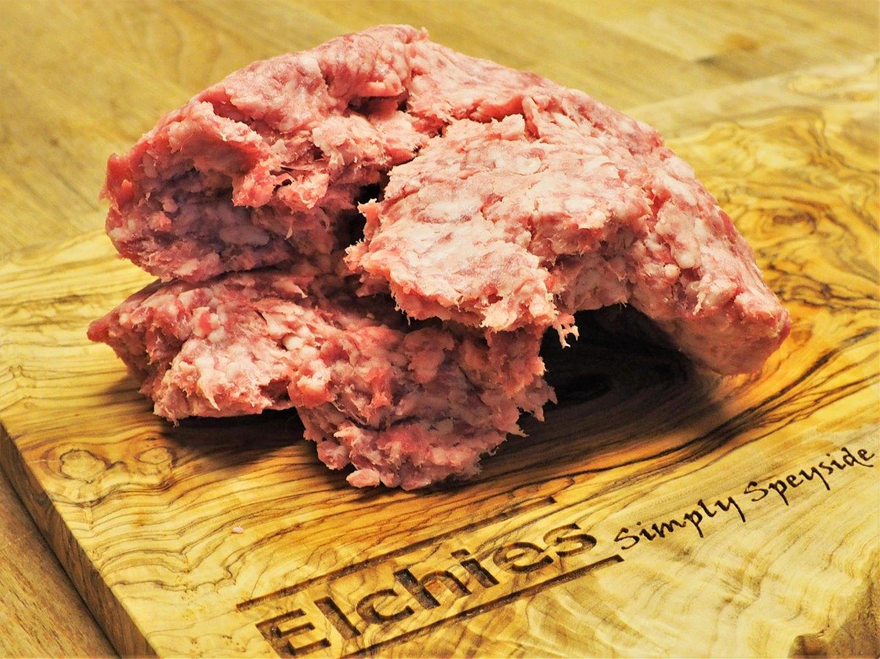 A portion of goat mince displayed on a branded Elchies wooden board. 