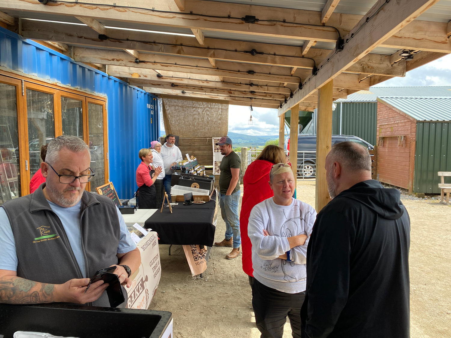 Visitors and market stalls set-up outside Elchies event space.
